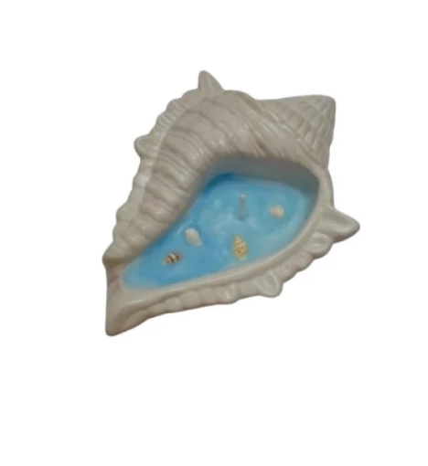 صورة شمعة Coquillage - لمسة من جمال البحر وسحر الصدف في منزلك